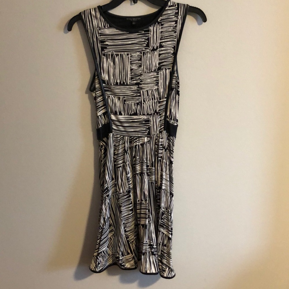 Patterned dress with leather accents